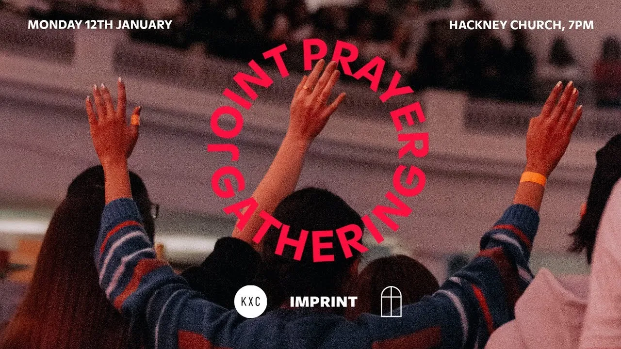 People worshipping with their hands raised